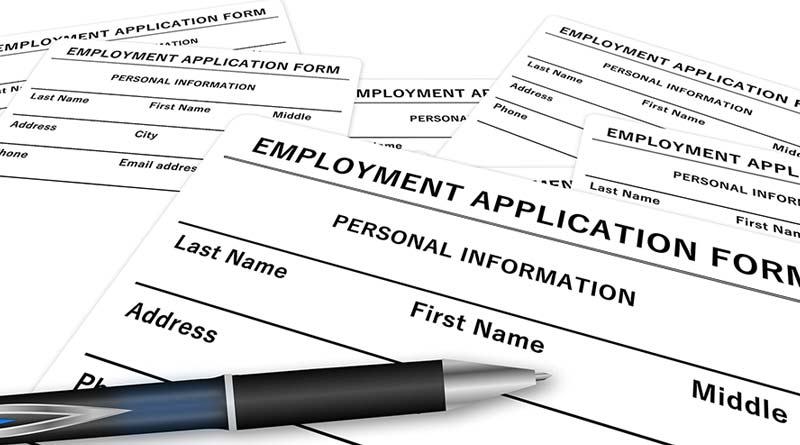 employment application with pen